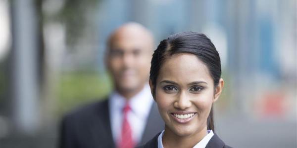 Woman in business attire.