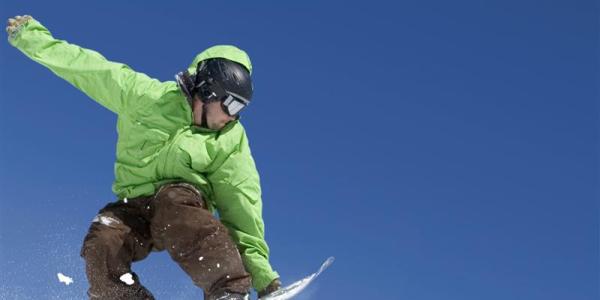 Man on snowboard.