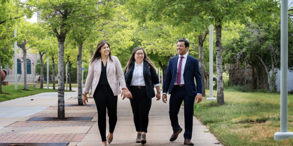 Students of the Masters in Sustainable Business degree walk to class.