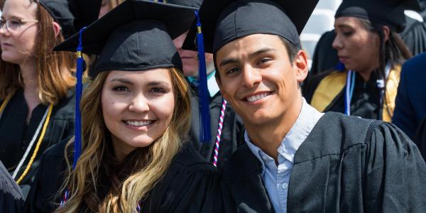 Graduates from the Major in Finance program pose for a photo at commencement.