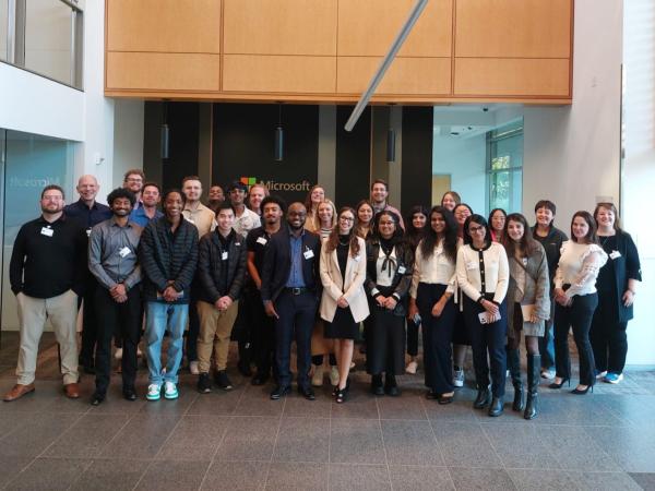 Group of students in front of sign at Microsoft headquarters